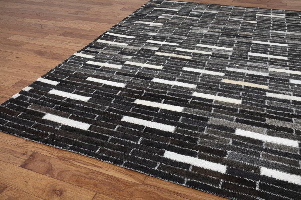 Sallee Handmade Charcoal Black Stripes Leather Rug | Modern Patchwork Cowhide Area Rug