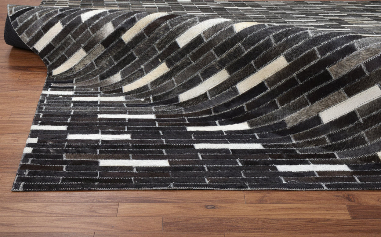 Sallee Handmade Charcoal Black Stripes Leather Rug | Modern Patchwork Cowhide Area Rug