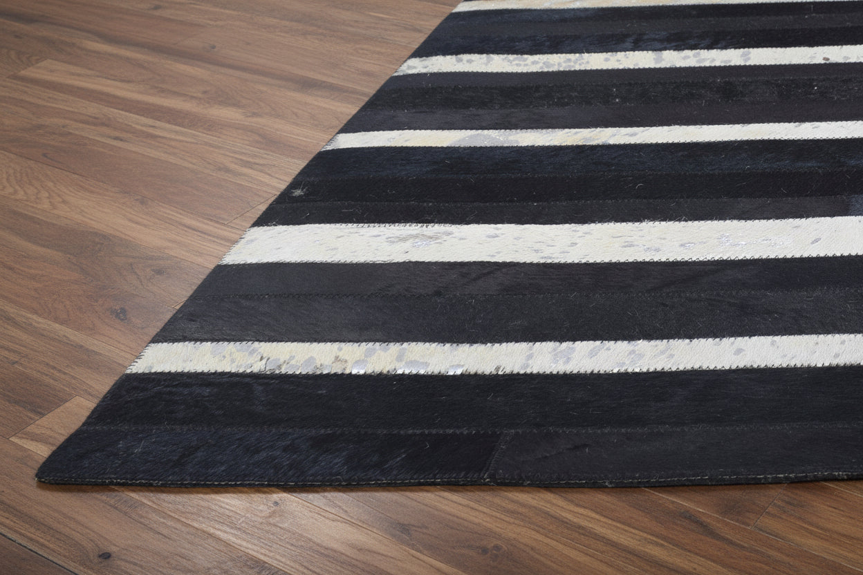 Jilleen Handmade Black Striped Leather Rug | Modern Patchwork Cowhide Rug   7864432328853